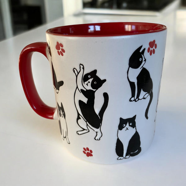 Playful Red Tuxedo Cat Coffee Mug